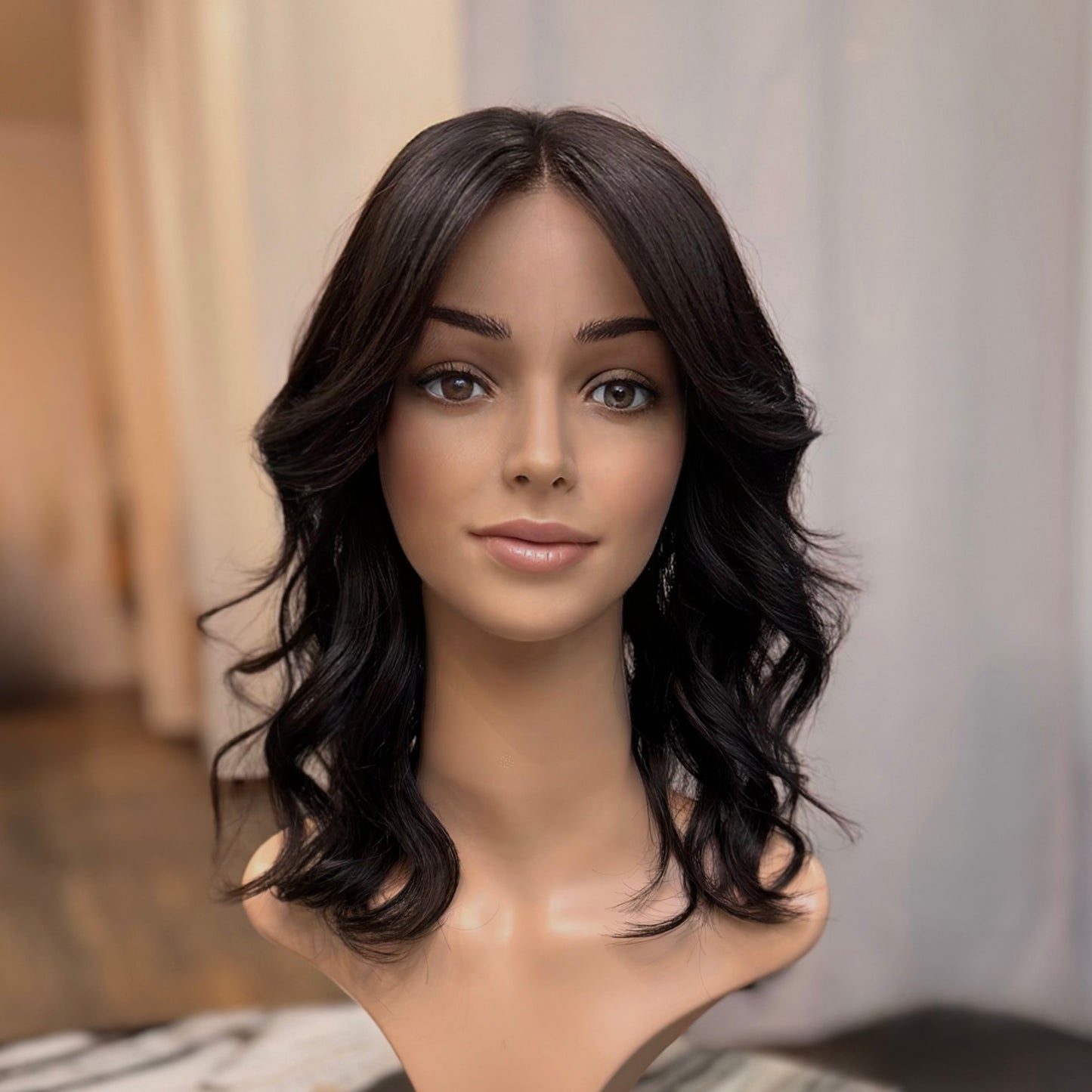 8.5x9 natural black human hair lace topper with soft natural waves, breathable lace base, and realistic scalp for women with thinning hair by Jo Hair Studio.