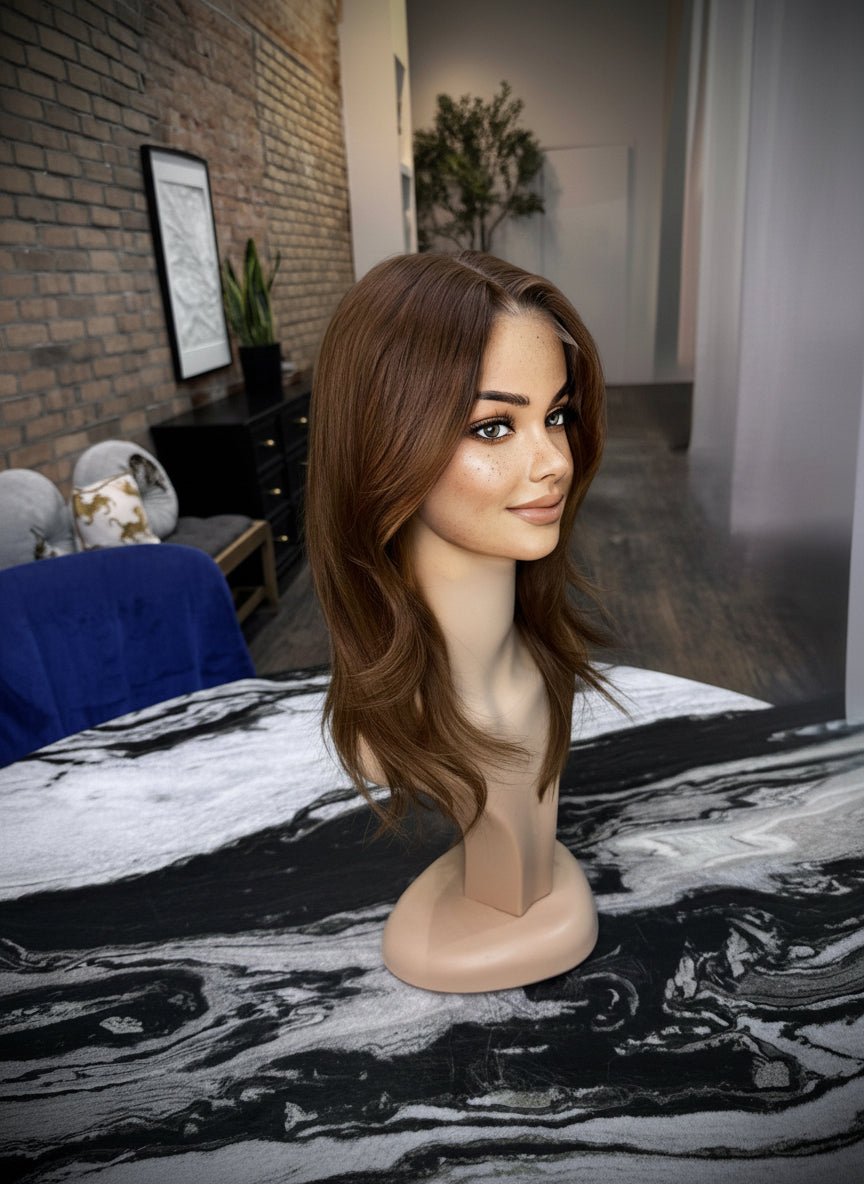 Auburn red shade detail of luxury human hair wig with natural shine