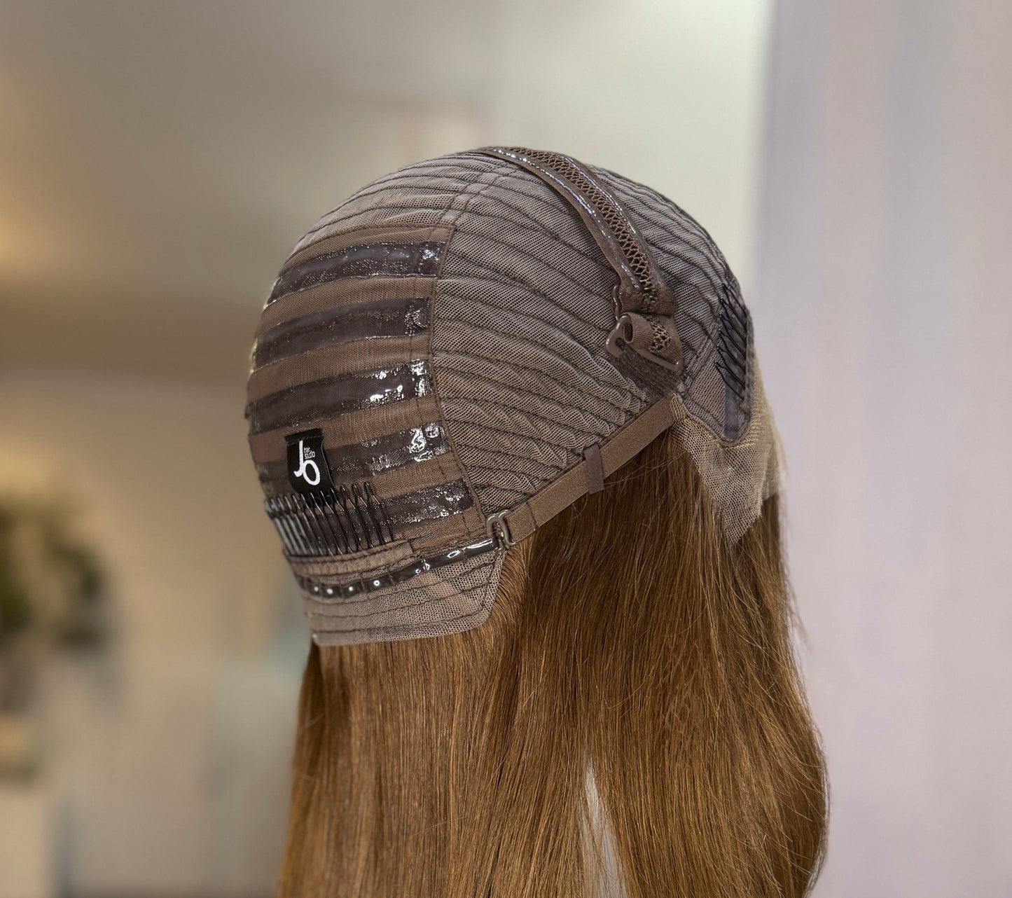 Model wearing luxury auburn red human hair wig with realistic hairline